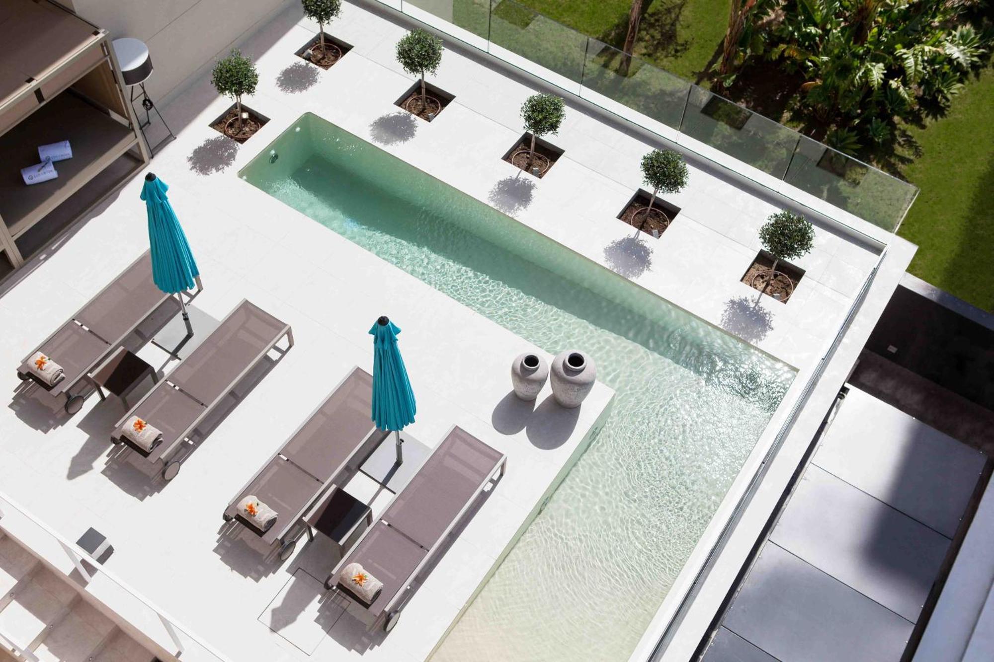 Don Carlos ماربيا المظهر الخارجي الصورة 3D rendering of a pool